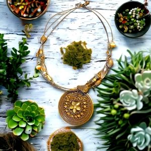 Gorgeous statement necklace with round medallion and beads